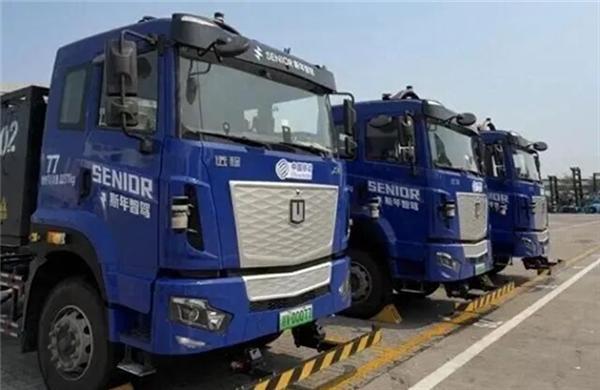 华东电子数智赋能，54辆无人集卡今年上岗洋浦港 助力海南自贸港打响智慧物流突围战